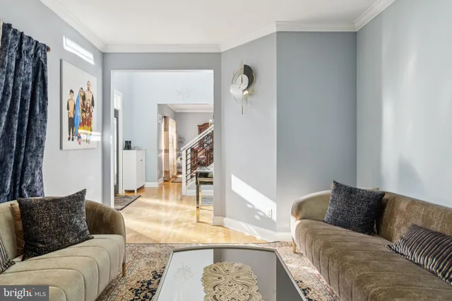 a kitchen with stainless steel appliances granite countertop a refrigerator a stove and a sink