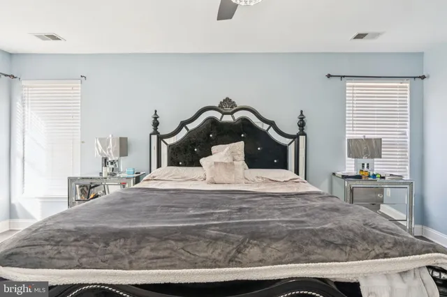 a bedroom with a bed and a cabinets