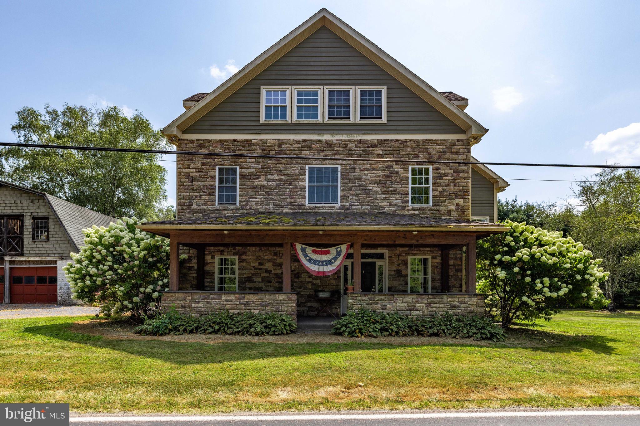 688 Sylvan Dell Road Williamsport, PA 17702 - Photo 1 of 73 a front view of a house with a yard