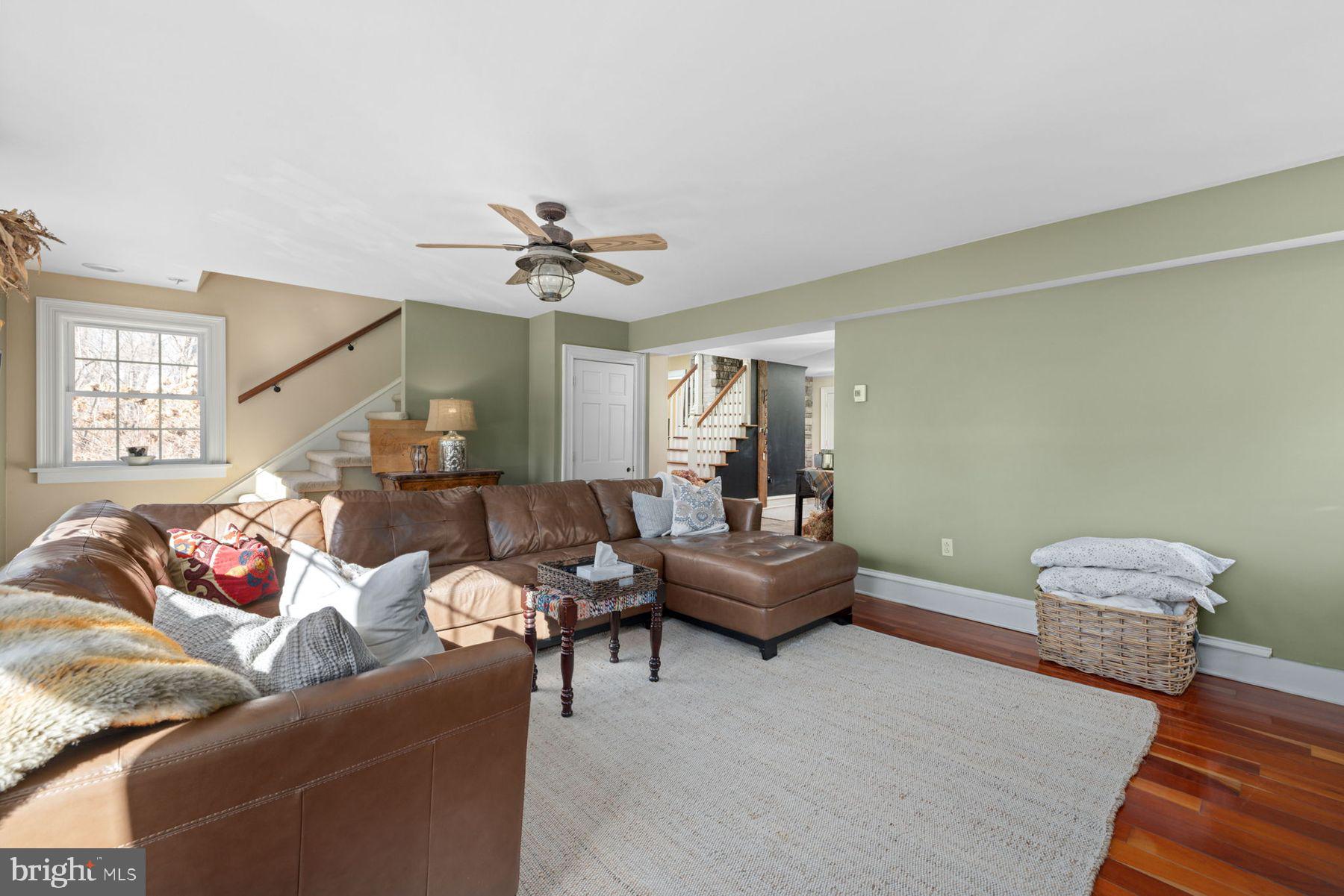 688 Sylvan Dell Road Williamsport, PA 17702 - Photo 31 of 73 a living room with furniture and a ceiling fan