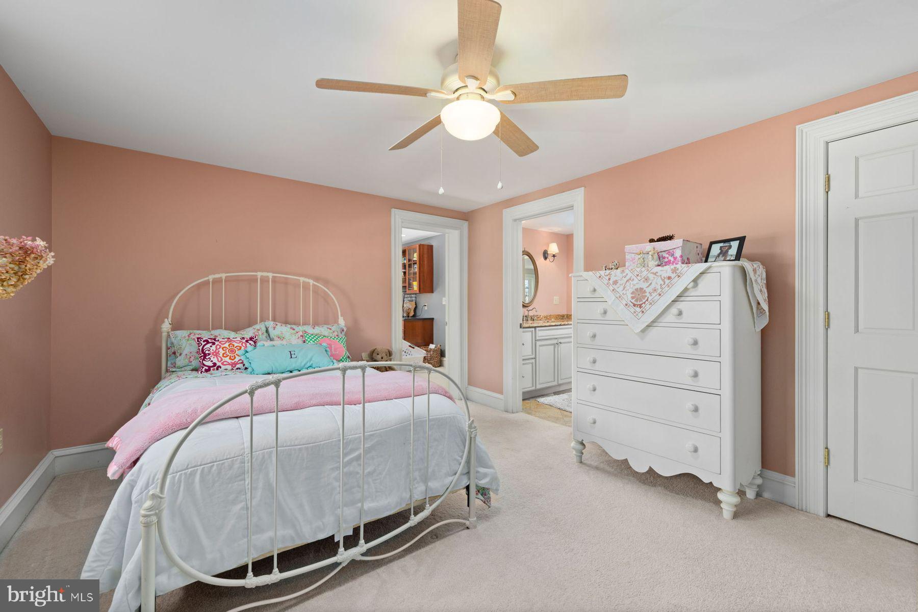 688 Sylvan Dell Road Williamsport, PA 17702 - Photo 36 of 73 a bedroom with a bed and a chandelier