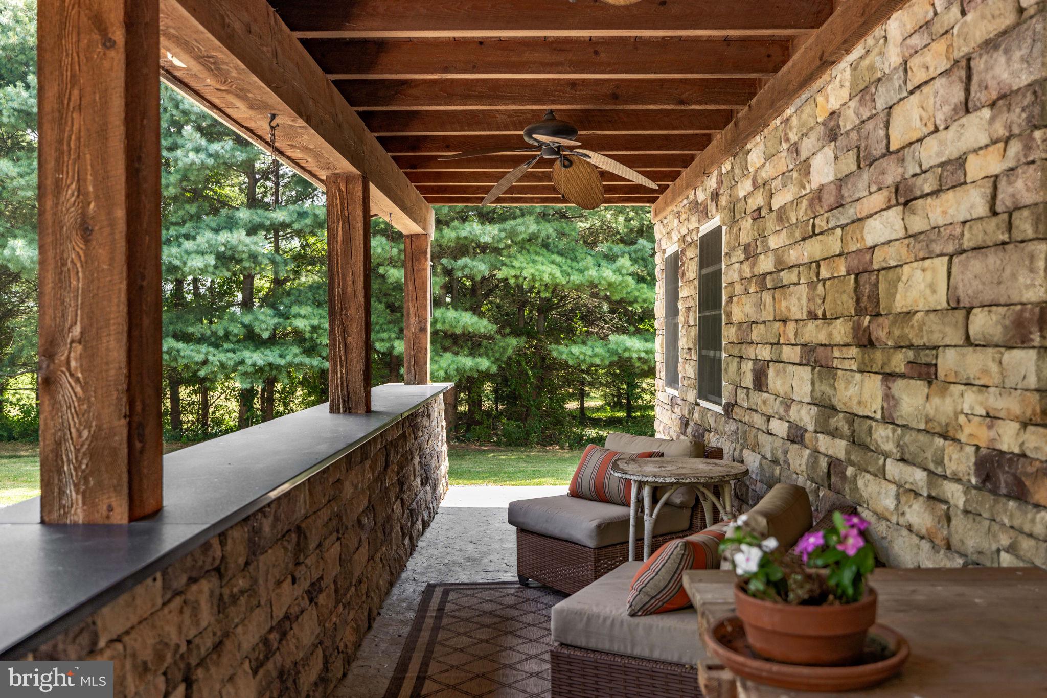 688 Sylvan Dell Road Williamsport, PA 17702 - Photo 5 of 73 a balcony with furniture and flowers
