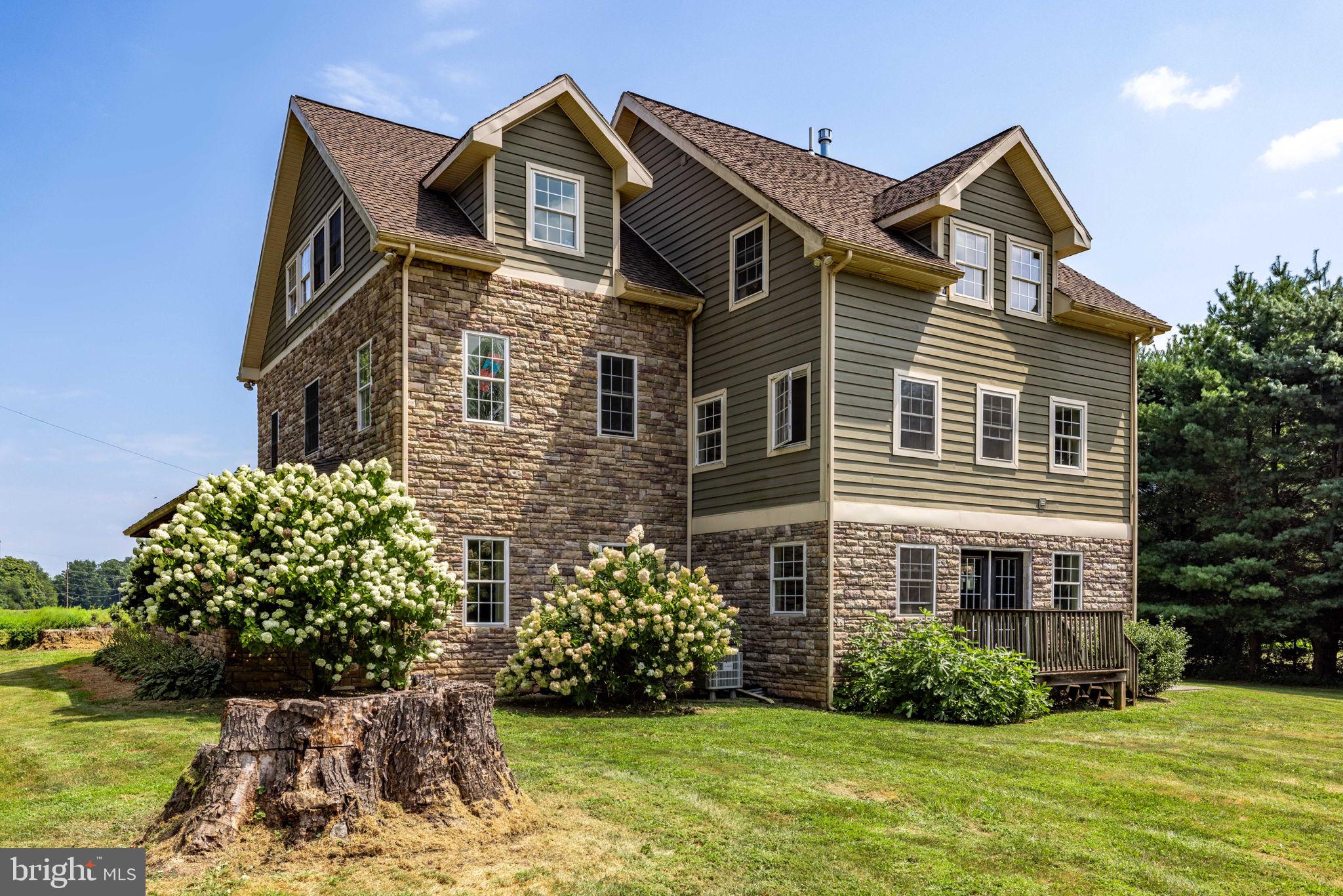 688 Sylvan Dell Road Williamsport, PA 17702 - Photo 6 of 73 a front view of a house with a yard