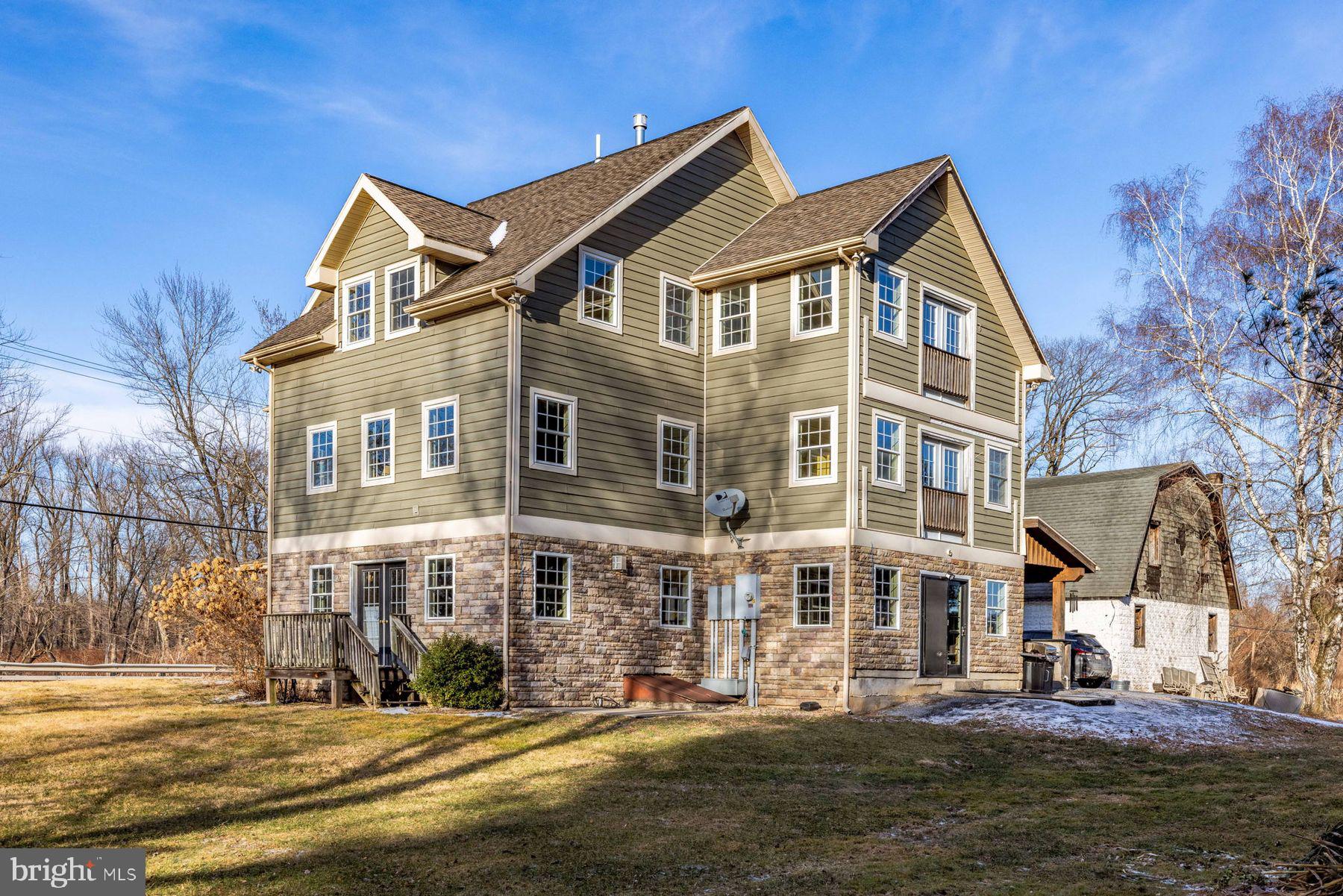 688 Sylvan Dell Road Williamsport, PA 17702 - Photo 67 of 73 a front view of a residential apartment building with a yard