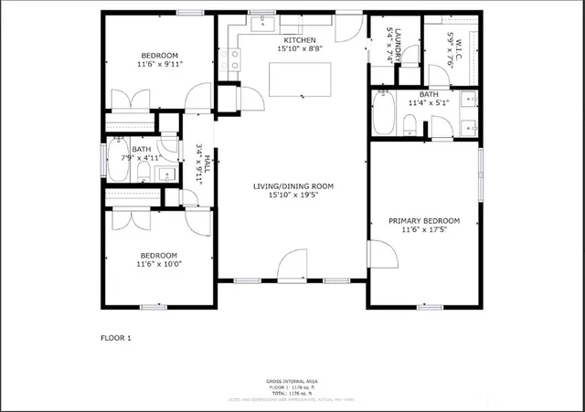 a white toilet sitting next to a bathroom sink and vanity