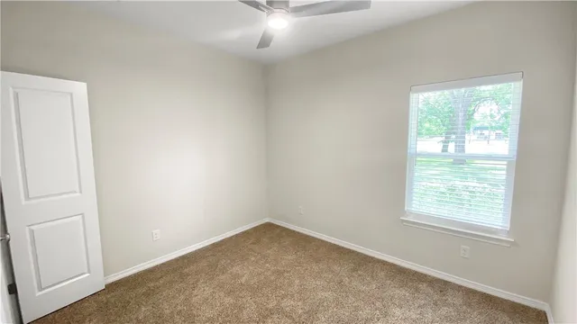a kitchen with a stove a sink and a refrigerator