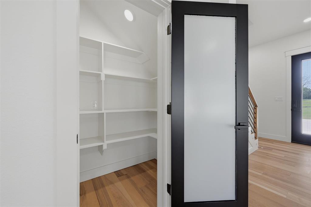 1805 Arthur Road Denison, TX 75021 - Photo 9 of 40 a view of walk in closet with empty racks