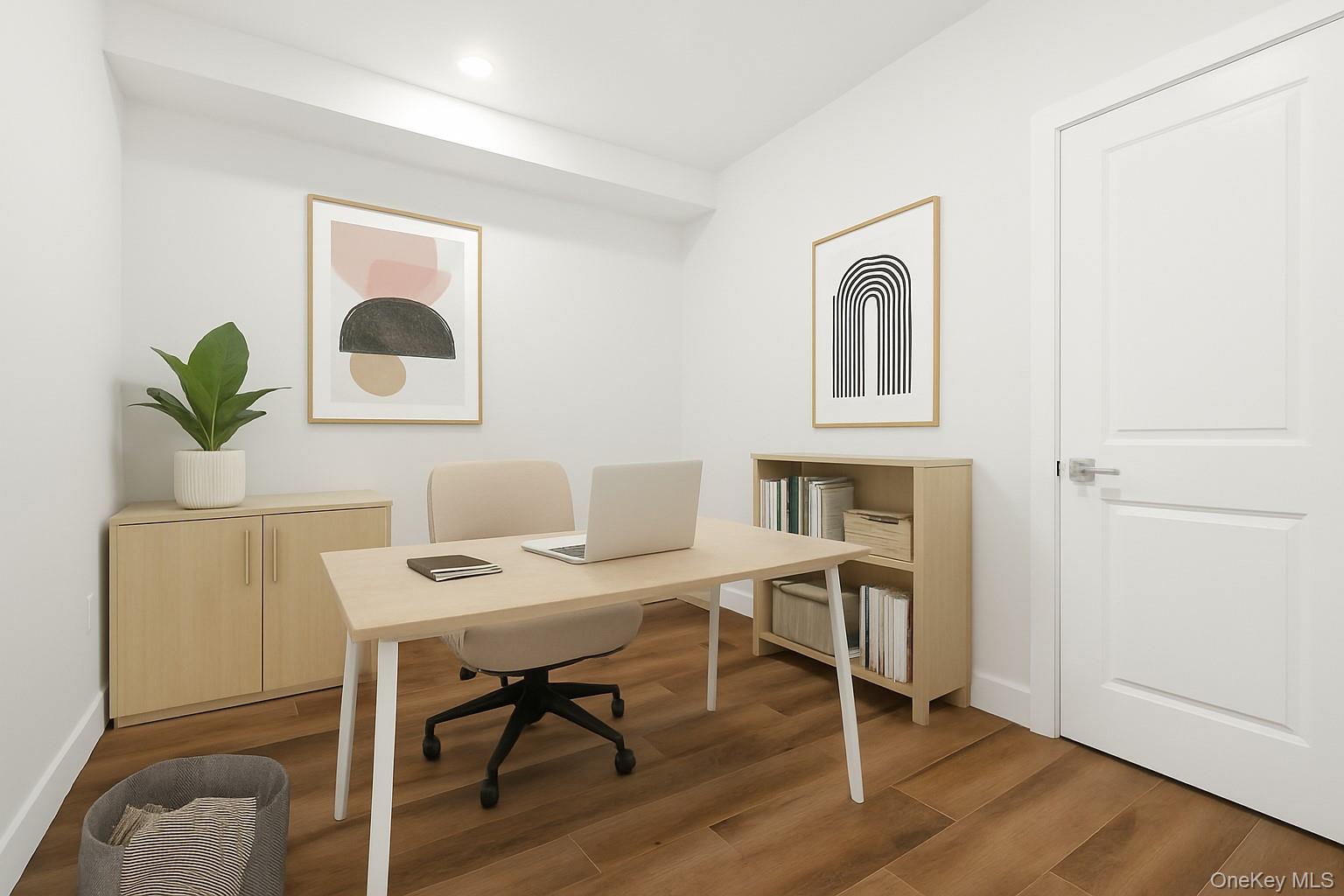 199 East Post Road, Unit 203 White Plains, NY 10601 - Photo 5 of 13 a workspace with furniture and wooden floor