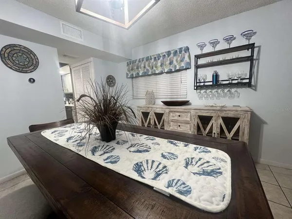 a view of kitchen island with wooden floor