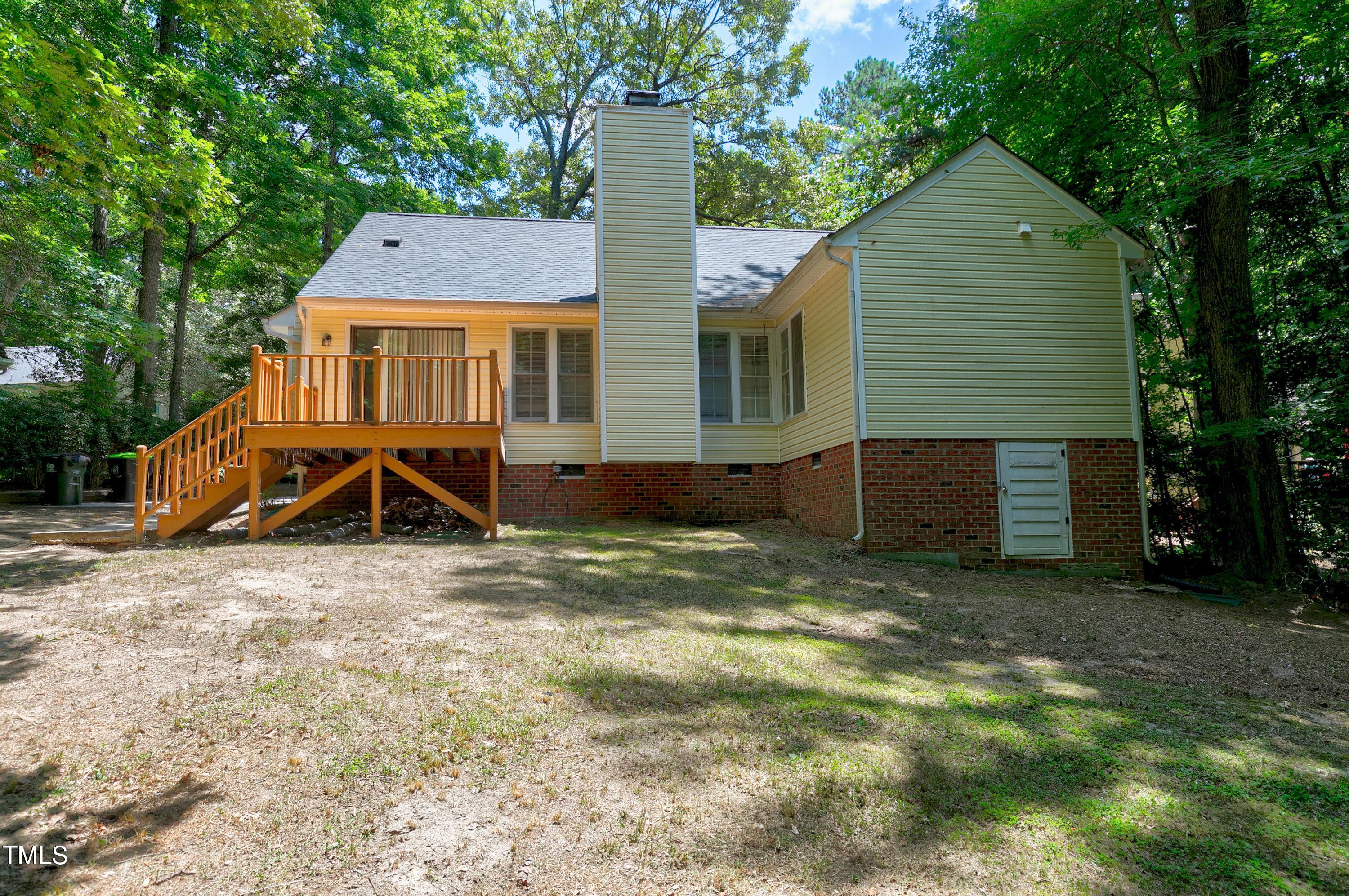 2313 Ruddy Road Raleigh, NC 27616 - Photo 6 of 32 a view of a house with a yard