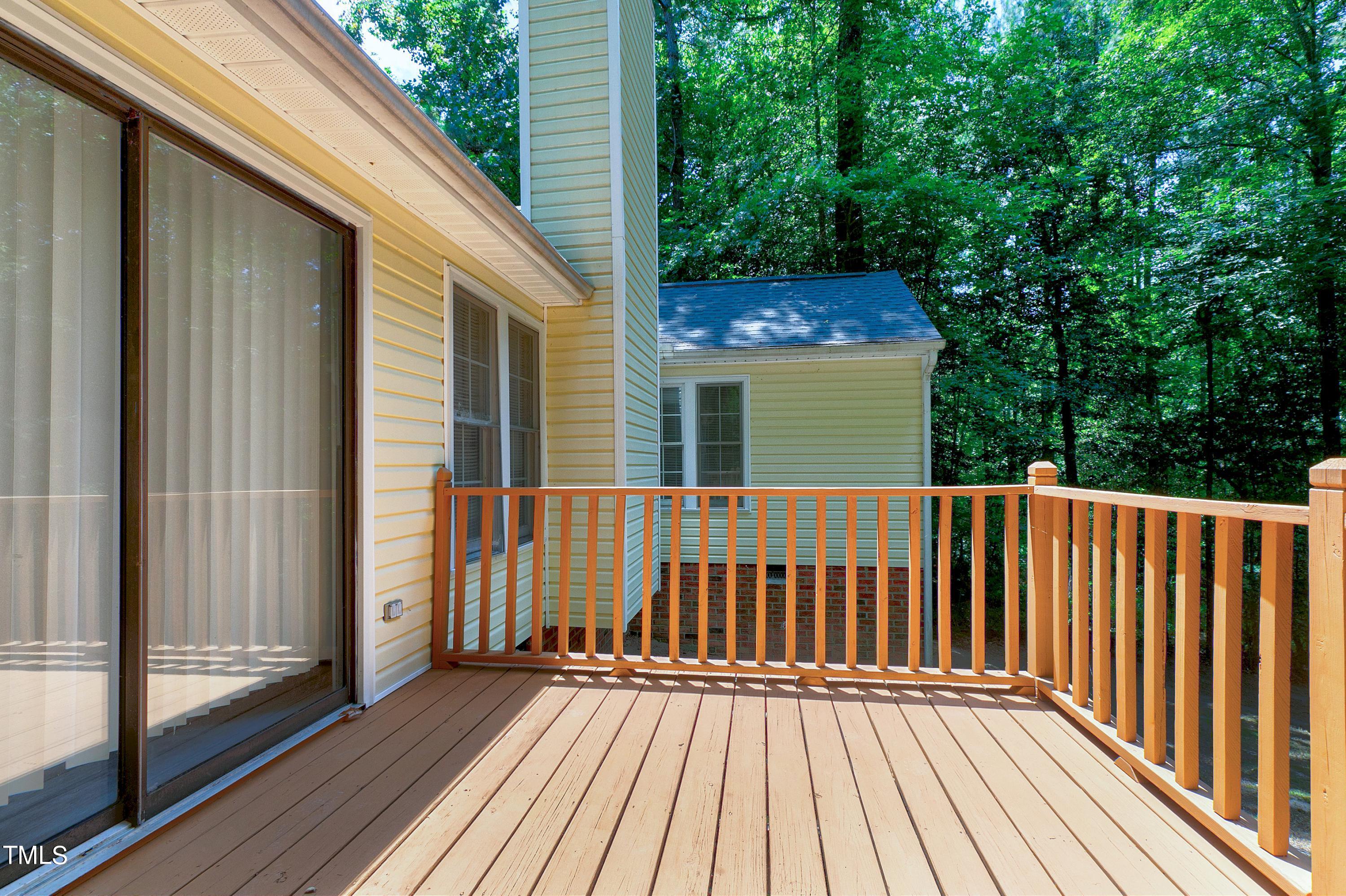 2313 Ruddy Road Raleigh, NC 27616 - Photo 8 of 32 a view of a wooden deck