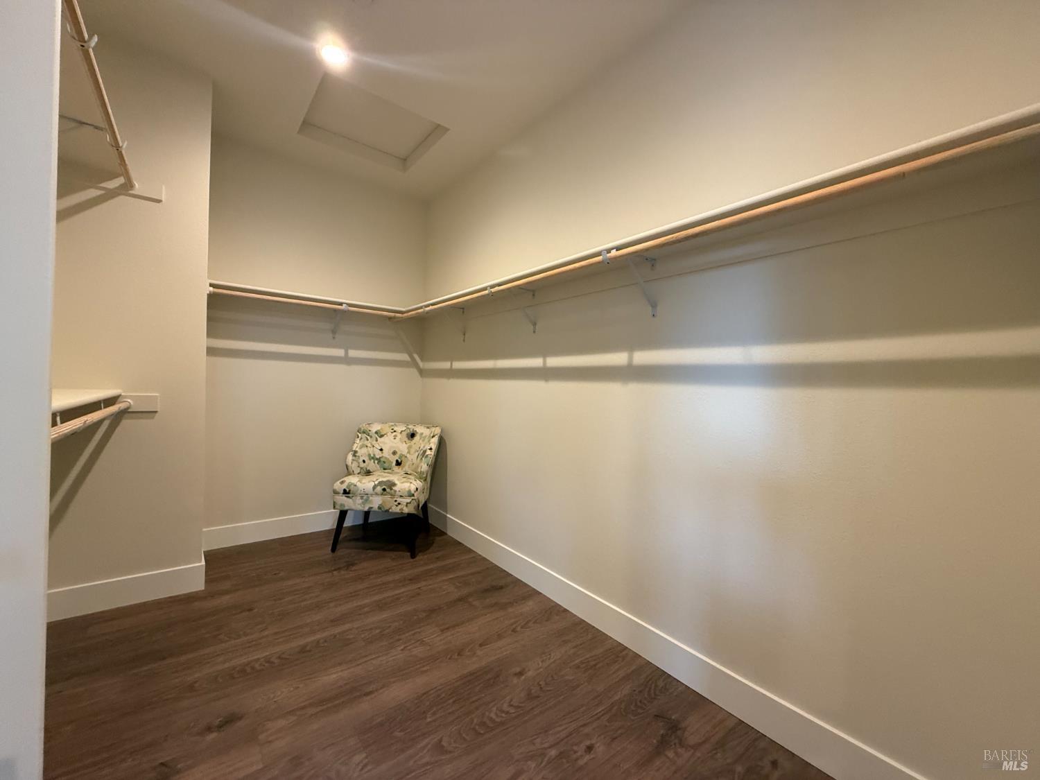 1901 Carlile Place Santa Rosa, CA 95403 - Photo 25 of 29 a hallway with a bed and wooden floor