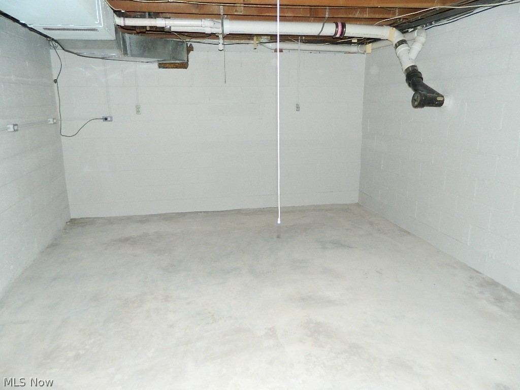 34505 Pettibone Road Solon, OH 44139 - Photo 23 of 32 Separate Workshop Area In Basement with Glass Block Window
