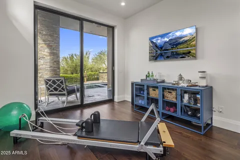 a room with furniture and a flat screen tv