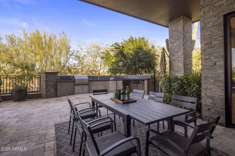 a view of an outdoor space with furniture