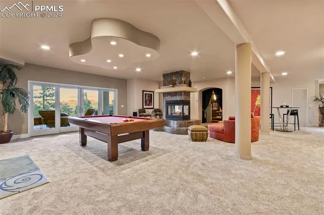 a living room with furniture and a table