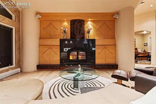 a kitchen with stainless steel appliances sink cabinets and window