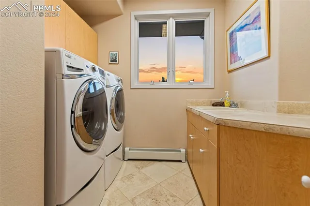 a outdoor living space with a table and chairs