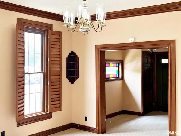 a view of front door and bedroom