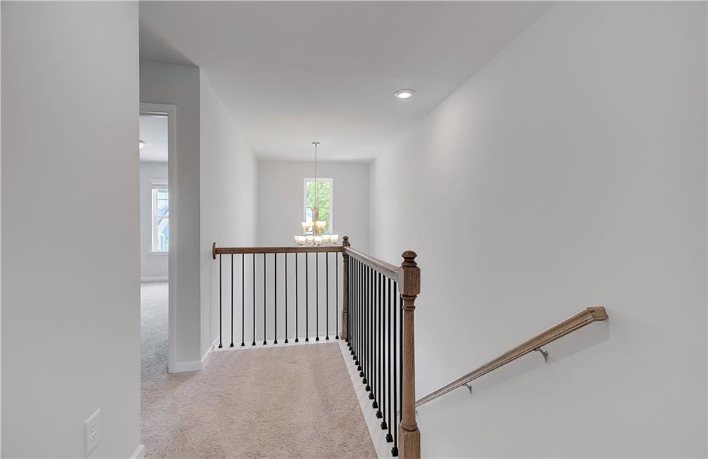 107 Alpine Road Fairburn, GA 30213 - Photo 13 of 22 a view of a hallway with windows