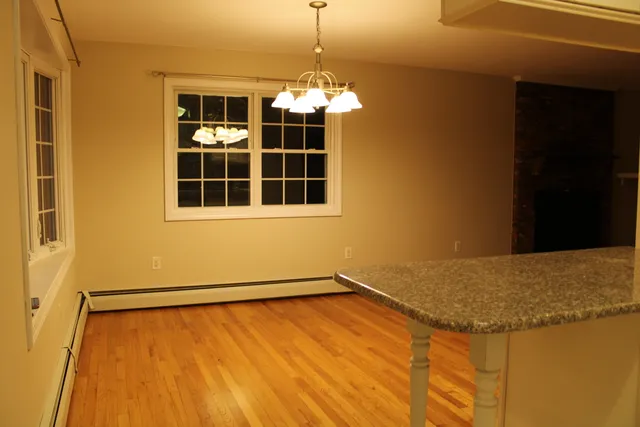 a view of a room with windows