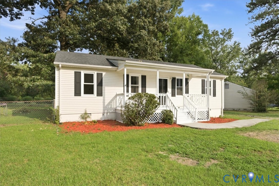 21103 Rabbit Run Petersburg, VA 23803 - Photo 4 of 27 White siding exterior with a covered front porch f