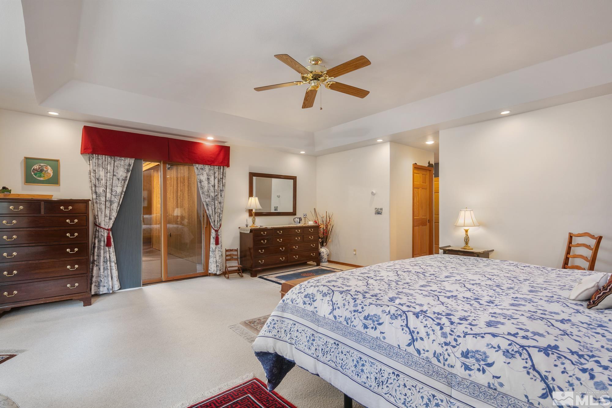 35 Austrian Pine Circle Reno, NV 89511 - Photo 19 of 39 a bedroom with a bed and dresser