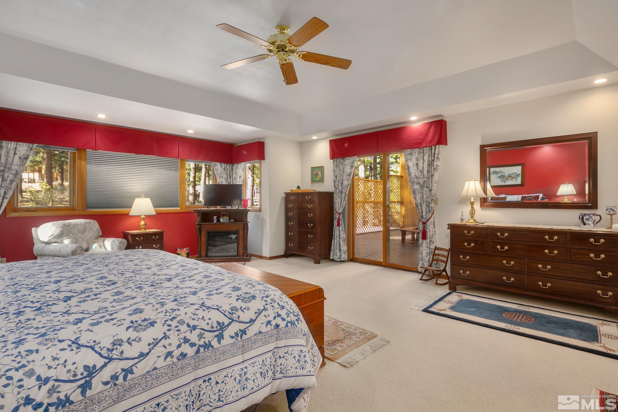 35 Austrian Pine Circle Reno, NV 89511 - Photo 20 of 39 a bedroom with a bed and dresser with mirror