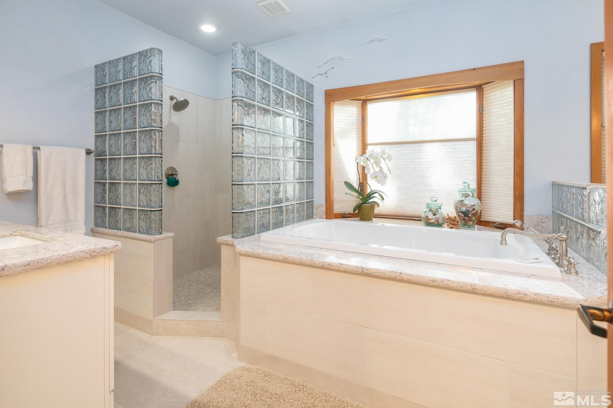 35 Austrian Pine Circle Reno, NV 89511 - Photo 24 of 39 a bedroom with a bed and a window