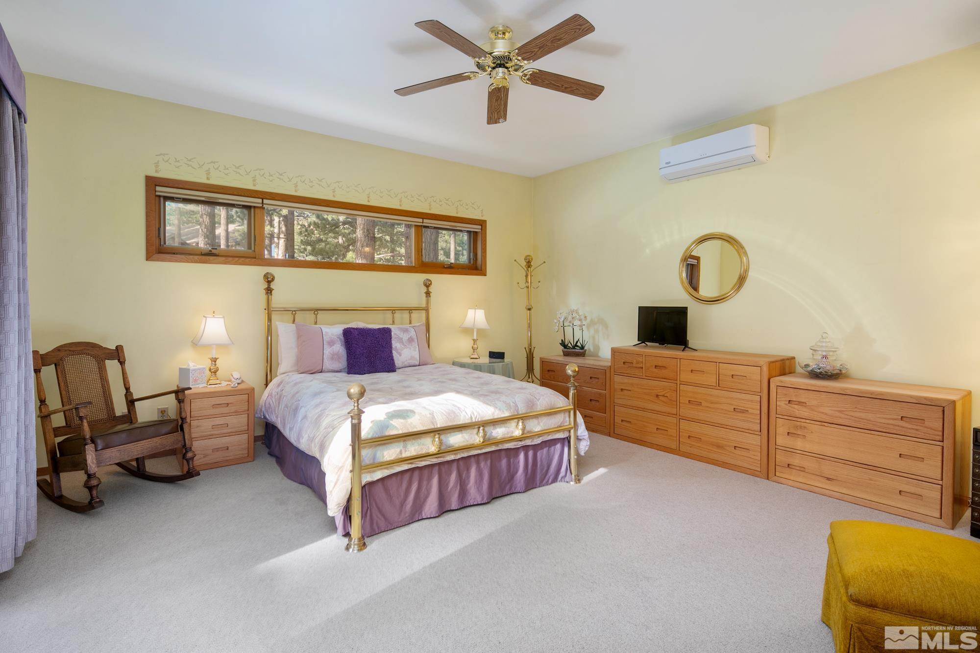 35 Austrian Pine Circle Reno, NV 89511 - Photo 25 of 39 a bedroom with a bed and window