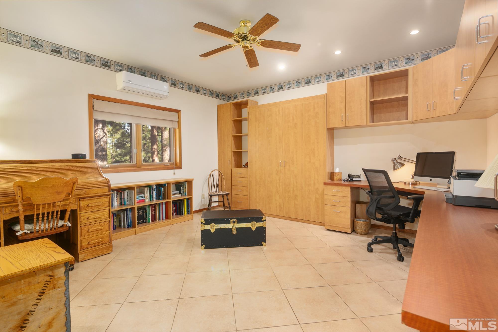 35 Austrian Pine Circle Reno, NV 89511 - Photo 29 of 39 a living room with furniture and a flat screen tv