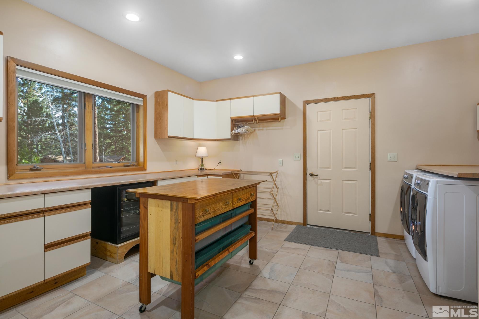 35 Austrian Pine Circle Reno, NV 89511 - Photo 31 of 39 a kitchen with a stove and a refrigerator
