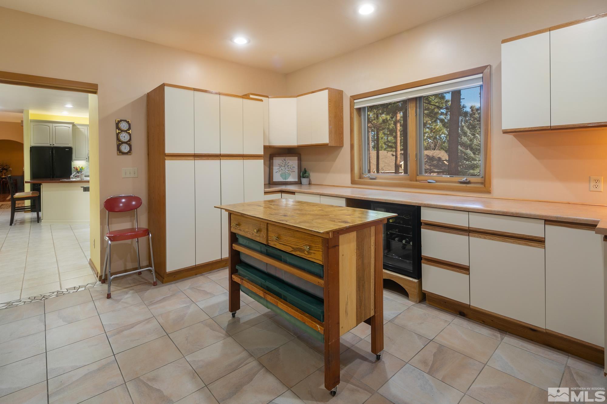 35 Austrian Pine Circle Reno, NV 89511 - Photo 32 of 39 a kitchen that has a lot of cabinets in it and appliances