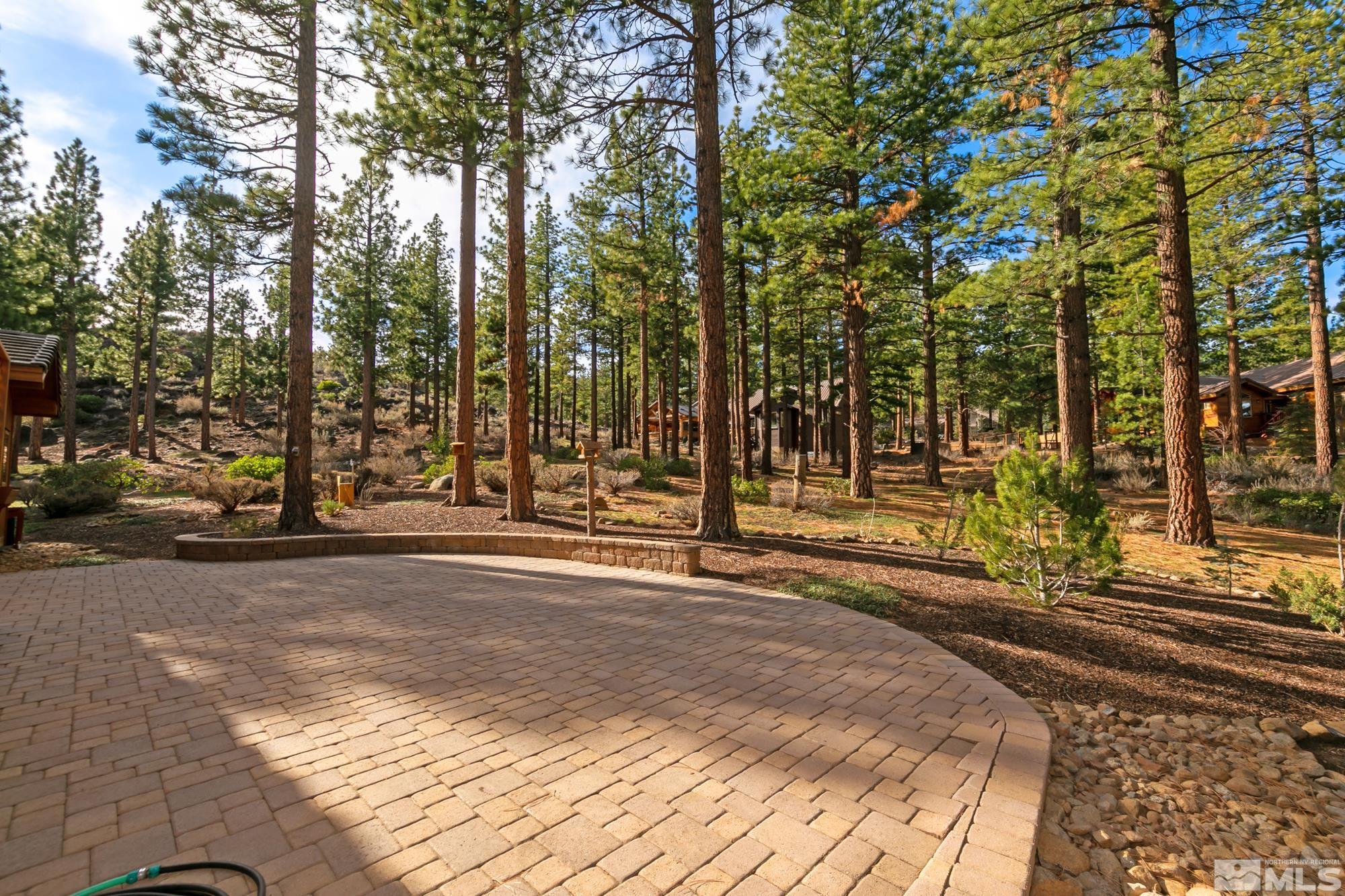 35 Austrian Pine Circle Reno, NV 89511 - Photo 39 of 39 a view of a house with trees next to a road