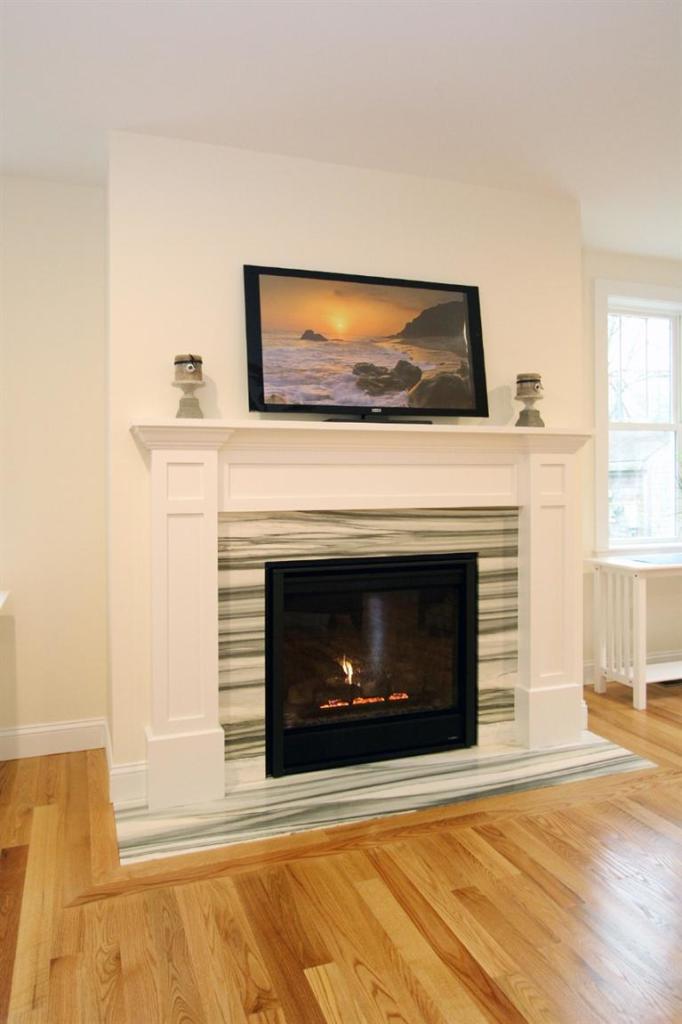 150 Long Road Harwich, MA 02645 - Photo 10 of 24 a living room with a fireplace