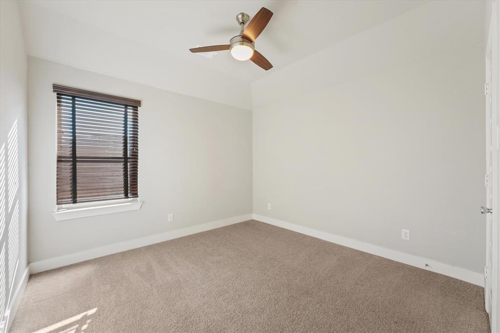 2044 Longbridge Road Forney, TX 75126 - Photo 23 of 40 Recessed ceiling with an attached ceiling fan, neutral carpet flooring, and a single window with blinds