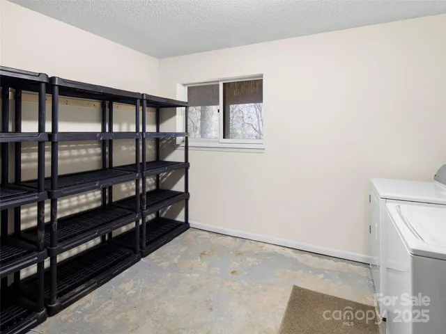 a view of a room with racks on the wall