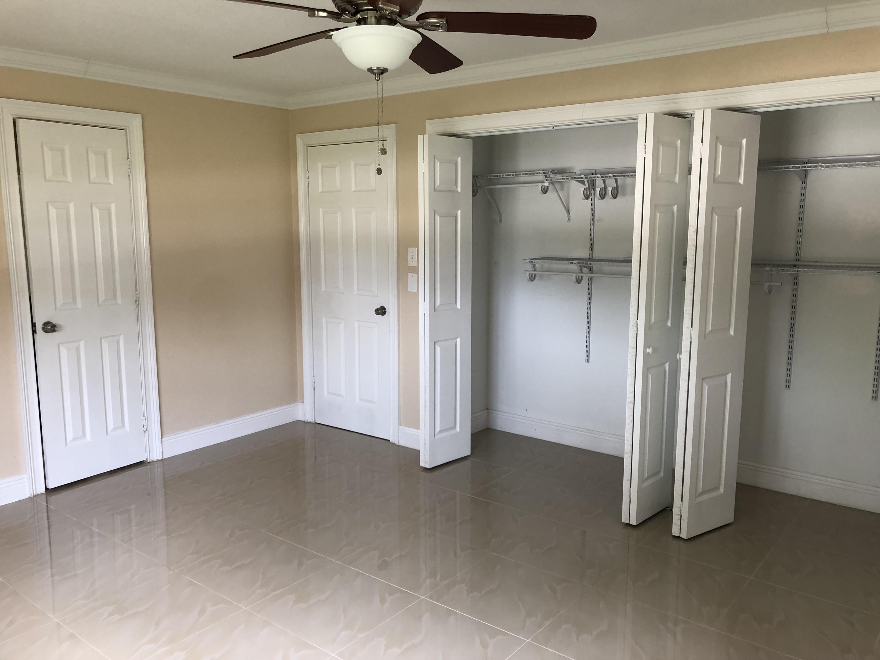 2731 Cambridge Road Lake Worth, FL 33462 - Photo 22 of 42 master closets
