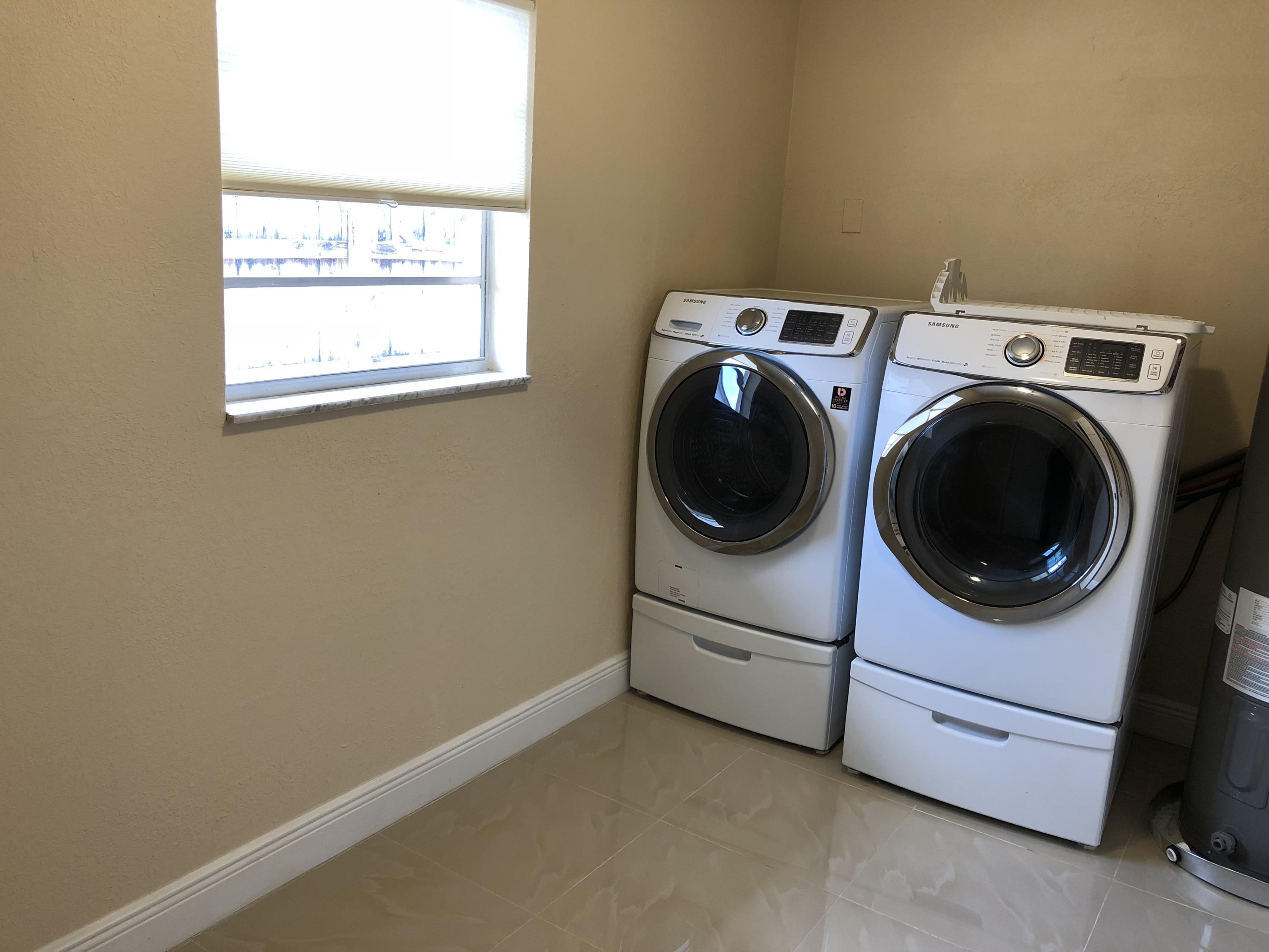 2731 Cambridge Road Lake Worth, FL 33462 - Photo 27 of 42 big laundry space