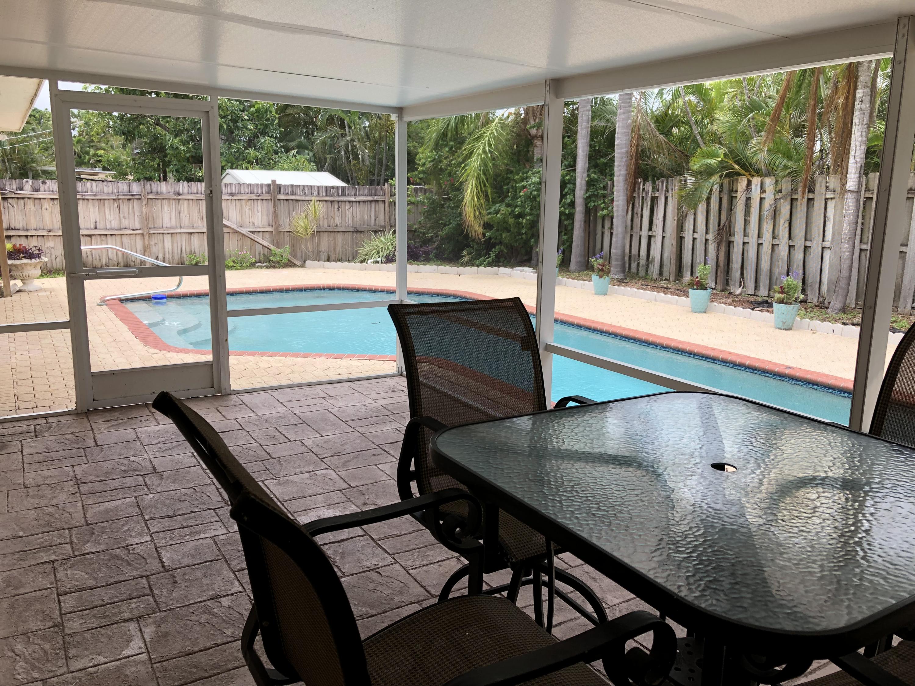 2731 Cambridge Road Lake Worth, FL 33462 - Photo 10 of 42 screened in patio
