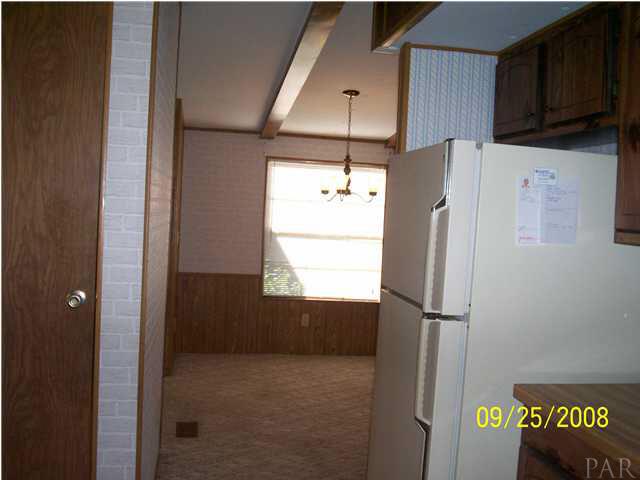 5280 Yellow Bluff Road Pensacola, FL 32507 - Photo 12 of 24 Looking from Kitchen into Formal Dining Room