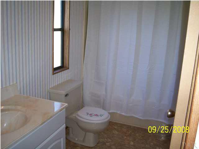 5280 Yellow Bluff Road Pensacola, FL 32507 - Photo 16 of 24 Entering Master Bath from Master Bedroom