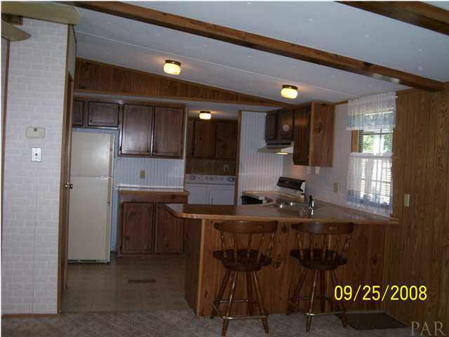 5280 Yellow Bluff Road Pensacola, FL 32507 - Photo 7 of 24 Looking directly into Kitchen from Greatroom/Family Room