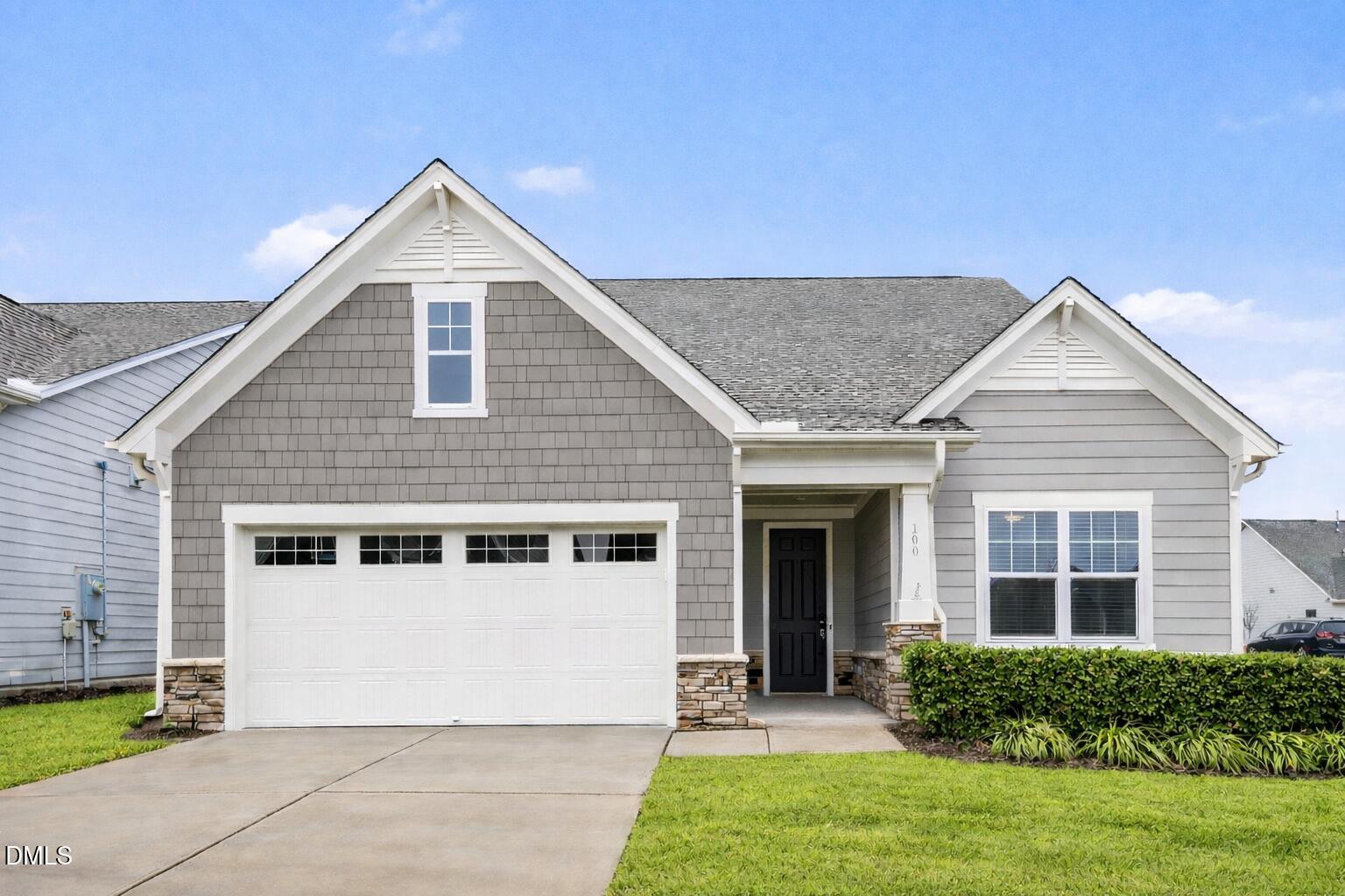 100 Ivory Lane Raleigh, NC 27610 - Photo 1 of 18 Modern suburban home with green lawn