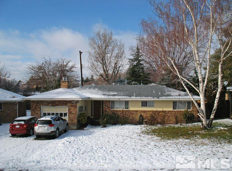 1225 Washington Street Reno, NV 89503 - Photo 1 of 1 a front view of a house with a yard