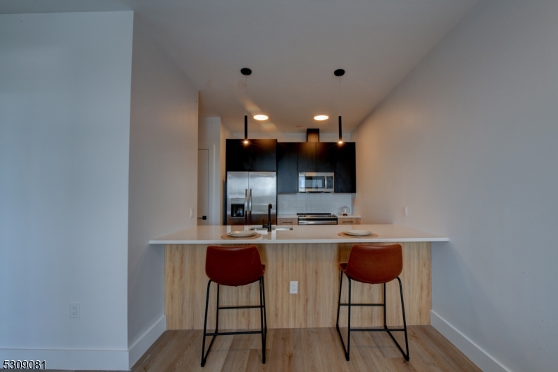 39 Madison Street Newark, NJ 07105 - Photo 6 of 33 a kitchen with a sink cabinets and window