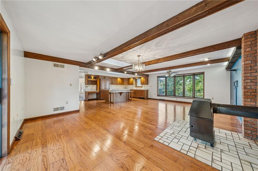 12219 Roth Drive Irwin, PA 15642 - Photo 15 of 49 a view of a room with wooden floor and a window