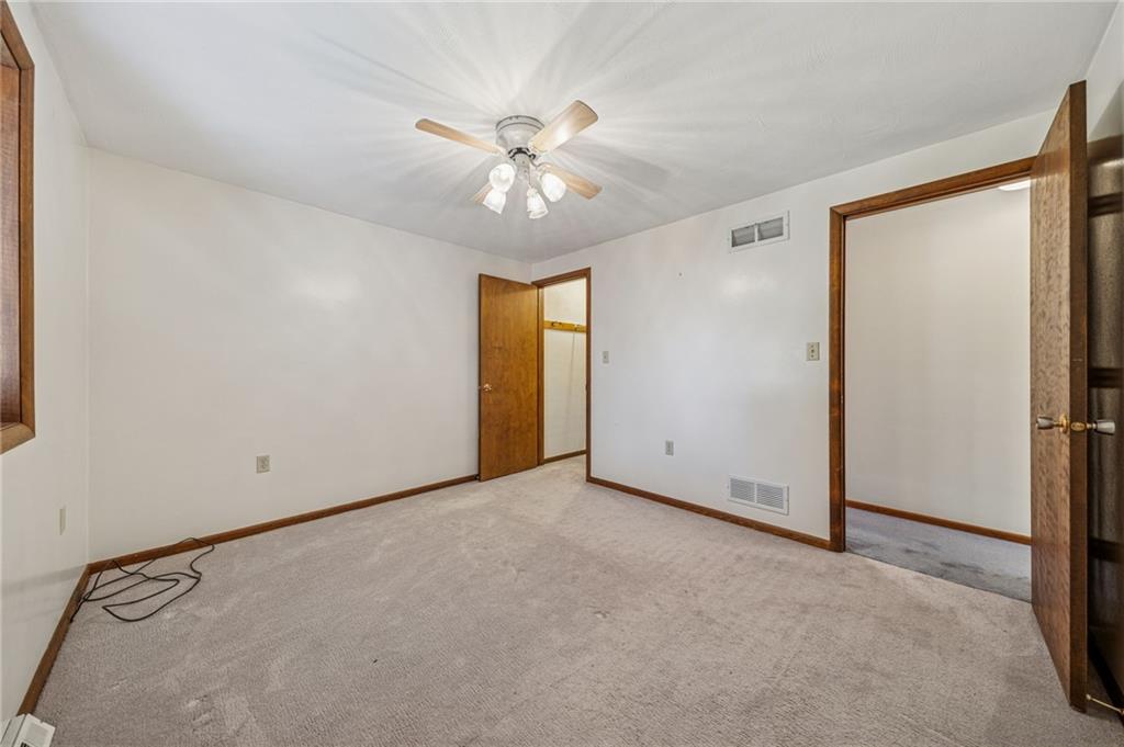 12219 Roth Drive Irwin, PA 15642 - Photo 21 of 49 an empty room with windows and fan