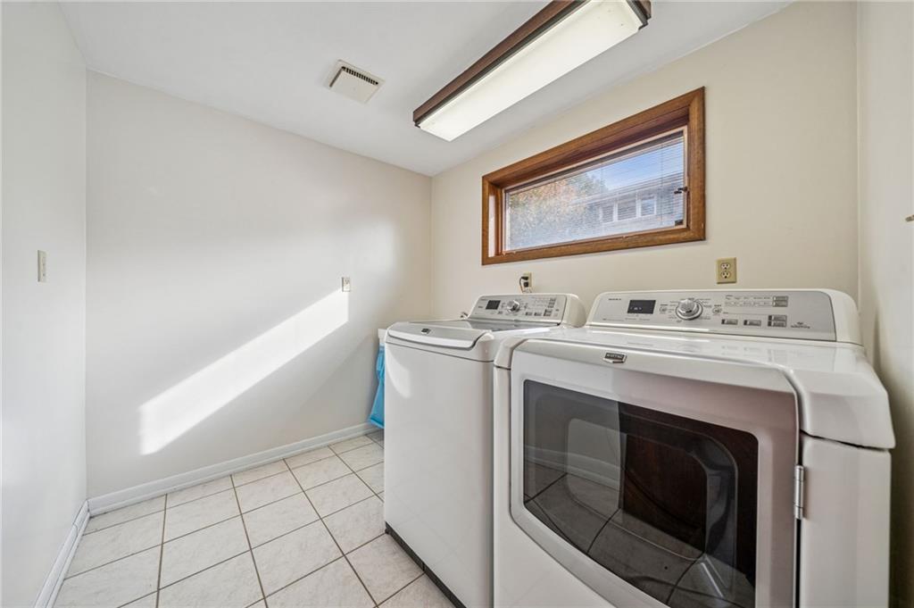 12219 Roth Drive Irwin, PA 15642 - Photo 26 of 49 a utility room with washer and dryer