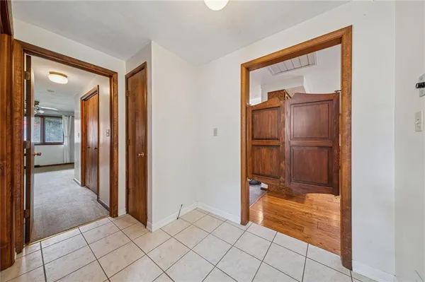 a view of a bathroom from the hallway